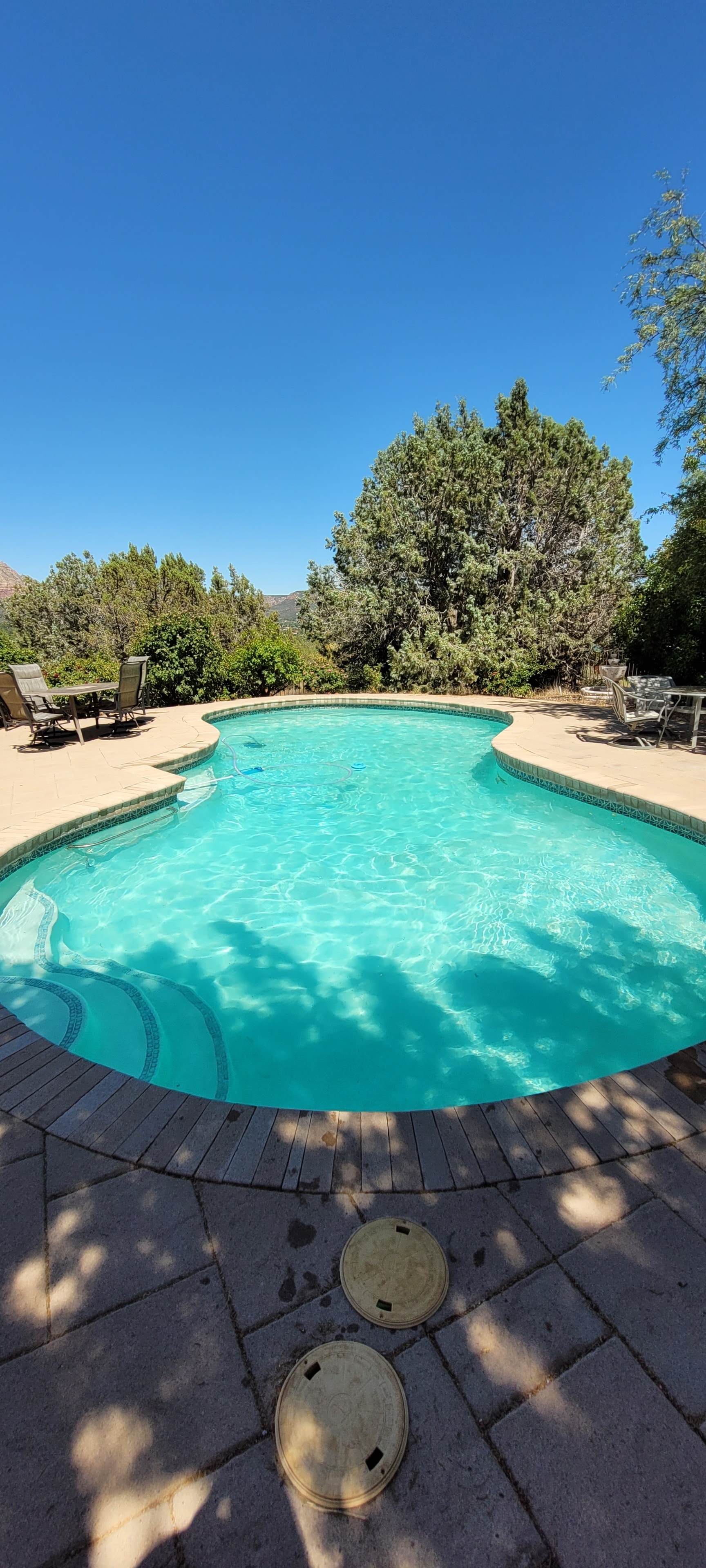 Pool cleaning technician at work